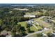 Aerial view of the home's beautiful property, showcasing the surrounding landscape and neighborhood at 3099 Trinity Church Rd, Concord, NC 28027