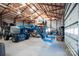 Spacious garage interior with high ceilings and ample storage at 3099 Trinity Church Rd, Concord, NC 28027