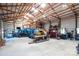 Expansive garage interior showcasing multiple storage solutions and equipment at 3099 Trinity Church Rd, Concord, NC 28027