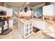 Well-appointed kitchen with custom cabinets, tile countertops, and stainless steel appliances at 3099 Trinity Church Rd, Concord, NC 28027