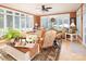 Cozy living room filled with natural light from large windows, showcasing comfortable seating arrangements at 3099 Trinity Church Rd, Concord, NC 28027