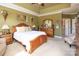 Spacious main bedroom featuring a trey ceiling, a wooden dresser, and soft, neutral carpeting at 3099 Trinity Church Rd, Concord, NC 28027