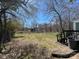 Backyard featuring a spacious grass area at 313 Nassau Pl, Gastonia, NC 28052