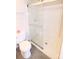 Bathroom featuring a white toilet, and a glass-enclosed shower at 313 Nassau Pl, Gastonia, NC 28052