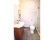 Bathroom featuring a vanity, toilet, and glass-enclosed shower at 313 Nassau Pl, Gastonia, NC 28052
