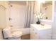 Updated bathroom features a shower-tub combo, vanity, and neutral finishes at 313 Nassau Pl, Gastonia, NC 28052