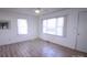 Cozy bedroom with plenty of natural light and neutral finishes at 313 Nassau Pl, Gastonia, NC 28052