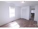 Bedroom features new floors, closet, and window, creating a comfortable retreat at 313 Nassau Pl, Gastonia, NC 28052