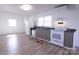 Well-lit kitchen with stainless steel appliances and modern cabinets at 313 Nassau Pl, Gastonia, NC 28052
