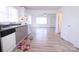 Well-lit kitchen features modern appliances, stylish flooring, and convenient open layout at 313 Nassau Pl, Gastonia, NC 28052
