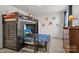 Fun bedroom offers bunk beds, stuffed animals and plenty of natural light at 3212 Burnello Ct, Iron Station, NC 28080