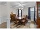 Formal dining room featuring coffered ceiling, wainscoting and stylish furniture at 3212 Burnello Ct, Iron Station, NC 28080