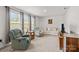 Cozy living room featuring comfortable seating, a TV, and large windows that offer ample natural light at 3212 Burnello Ct, Iron Station, NC 28080