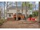 Spacious backyard with deck and cozy fire pit area, perfect for relaxing and entertaining guests at 3400 Thistle Bloom Ct, Charlotte, NC 28269