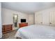 Bedroom featuring a television, dresser, and access to an en-suite bathroom at 3400 Thistle Bloom Ct, Charlotte, NC 28269