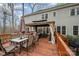 Inviting outdoor deck with dining and lounge seating, complemented by a gazebo, ideal for relaxation and entertaining at 3400 Thistle Bloom Ct, Charlotte, NC 28269