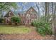 Charming two-story brick home featuring a well-manicured lawn and a welcoming front entrance at 3400 Thistle Bloom Ct, Charlotte, NC 28269