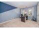 Bright office space with two windows, modern lighting, and a neutral color palette for a productive work environment at 3400 Thistle Bloom Ct, Charlotte, NC 28269