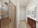 Bathroom featuring a glass-enclosed shower and vanity with great lighting at 4001 Perth Rd, Fort Mill, SC 29707