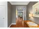 Inviting entryway with hardwood floors, a decorative table and neutral paint at 4001 Perth Rd, Fort Mill, SC 29707