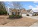 Beautiful brick home with an attached garage and manicured landscaping at 4001 Perth Rd, Fort Mill, SC 29707