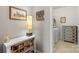 Inviting hallway featuring decorative accents and leading to a laundry room with a washer and dryer at 4001 Perth Rd, Fort Mill, SC 29707