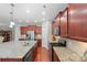 Spacious kitchen features stainless steel appliances, granite countertops, and wooden cabinets at 4001 Perth Rd, Fort Mill, SC 29707