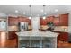 Modern kitchen with an island, stainless steel appliances, and ample storage space at 4001 Perth Rd, Fort Mill, SC 29707