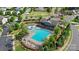 Stunning aerial view of neighborhood pool with lounge chairs and lush landscaping at 4001 Perth Rd, Fort Mill, SC 29707