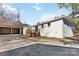 Rear exterior view of the home showcasing a deck, carports and exterior at 4083 Hord Rd, Sharon, SC 29742