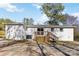 Back exterior view of the home featuring an elevated wood deck at 4083 Hord Rd, Sharon, SC 29742