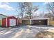 View of the red storage shed and two carports on the property at 4083 Hord Rd, Sharon, SC 29742