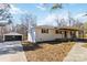 Exterior of home with a detached garage and a spacious front yard at 4083 Hord Rd, Sharon, SC 29742