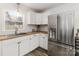 This well-lit kitchen features stainless steel appliances and butcher block countertops at 4083 Hord Rd, Sharon, SC 29742