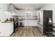 Modern kitchen features stainless steel appliances and butcher block countertops at 4083 Hord Rd, Sharon, SC 29742