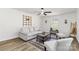 This living room features a modern decor, ceiling fan, and stylish furnishings at 4083 Hord Rd, Sharon, SC 29742