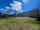 Large backyard offers ample green space and privacy, perfect for outdoor activities at 4232 Cornelia Ln, Rock Hill, SC 29732