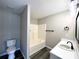 Bathroom featuring a shower over tub, white vanity, and modern finishes at 4232 Cornelia Ln, Rock Hill, SC 29732