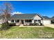 Charming single-story home features a front porch and well-maintained lawn and landscaping at 4232 Cornelia Ln, Rock Hill, SC 29732