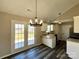 Eat-in kitchen features white cabinets, stainless steel appliances, and natural light at 4232 Cornelia Ln, Rock Hill, SC 29732
