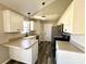 Updated kitchen with stainless steel appliances, granite countertops, and white cabinets at 4232 Cornelia Ln, Rock Hill, SC 29732