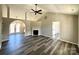 Spacious living room features vaulted ceilings, a fireplace, and wood-look flooring at 4232 Cornelia Ln, Rock Hill, SC 29732