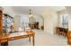 Large bonus room features ample lighting, built-in shelving, and a cozy workspace at 4828 Beth Ln, Harrisburg, NC 28075