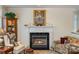 Elegant fireplace with marble surround, decorative mantel, and traditional decor at 4828 Beth Ln, Harrisburg, NC 28075