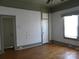 Inviting bedroom with hardwood floors, neutral walls, trim accents, and a bright window at 516 W 7Th St, Kannapolis, NC 28081