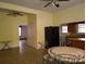 Dining area with ceiling fan, tile floors, and doorway to another room at 516 W 7Th St, Kannapolis, NC 28081