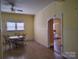 Open dining area featuring tile floors, large windows, and space for seating at 516 W 7Th St, Kannapolis, NC 28081