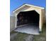 Garage featuring a sturdy frame and concrete floor, offering ample space for parking and storage in a functional design at 516 W 7Th St, Kannapolis, NC 28081