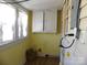 Laundry room with cabinet and windows at 516 W 7Th St, Kannapolis, NC 28081