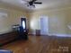 Bright living room with wood floors and white trim around windows and doors at 516 W 7Th St, Kannapolis, NC 28081